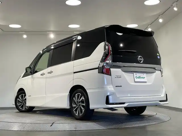 日産 セレナ ハイウェイスター V 愛知県 2020(令2)年 7.4万km ブリリアントホワイトパール 2トーン 純正10インチナビ/フリップダウンモニター/フロントエアロ/衝突軽減ブレーキ/両側電動スライドドア/アラウンドビューモニター/ビルトインETC/LEDヘッドライト/クルーズコントロール/ドライブレコーダー/ブラインドスポットモニター/フルセグTV/Bluetooth/コーナーセンサー/レーンキープアシスト/HDMI接続/プッシュスタート/USB接続/スマートキー/CD/DVD再生/アイドリングストップ/ミュージックサーバー/ミュージックプレイヤー接続/純正フロアマット/純正アルミホイール/オートライト/防水シート/禁煙車/後期モデル/2トーンカラー/ウィンカーミラー/電動格納ミラー/フォグランプ/Wエアコン/3列シート/ハンズフリーパワースライドドア/横滑り防止装置