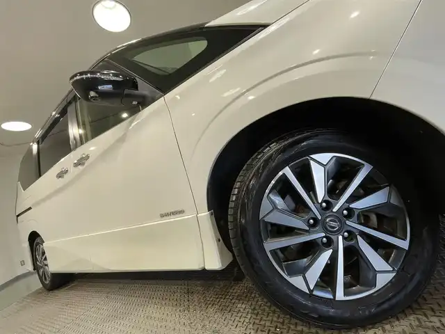 日産 セレナ ハイウェイスター V 愛知県 2020(令2)年 7.4万km ブリリアントホワイトパール 2トーン 純正10インチナビ/フリップダウンモニター/フロントエアロ/衝突軽減ブレーキ/両側電動スライドドア/アラウンドビューモニター/ビルトインETC/LEDヘッドライト/クルーズコントロール/ドライブレコーダー/ブラインドスポットモニター/フルセグTV/Bluetooth/コーナーセンサー/レーンキープアシスト/HDMI接続/プッシュスタート/USB接続/スマートキー/CD/DVD再生/アイドリングストップ/ミュージックサーバー/ミュージックプレイヤー接続/純正フロアマット/純正アルミホイール/オートライト/防水シート/禁煙車/後期モデル/2トーンカラー/ウィンカーミラー/電動格納ミラー/フォグランプ/Wエアコン/3列シート/ハンズフリーパワースライドドア/横滑り防止装置