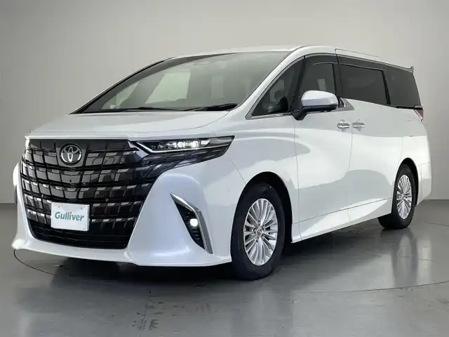 トヨタ アルファードハイブリット Z 愛知県 2024(令6)年 0.6万km プラチナホワイトパールマイカ 純正１４型DA　ムーンルーフ　HDMI　黒革　BSM　全方位カメラ　パーキングアシスト　追従クルコン　フルセグ　ETC２.0 ドラレコ　セーフティセンス　メモリーシート　パドルシフト　エアシート　禁煙　ステアリングヒーター　１５００W１００V充電　ワイヤレス充電　nanoe-X LEDオートライト　フォグランプ　純正フロアマット　USB　Bluetooth　コーナーセンサー　プッシュスタート　スマートキー　スペアタイヤ アドバンスドパーク