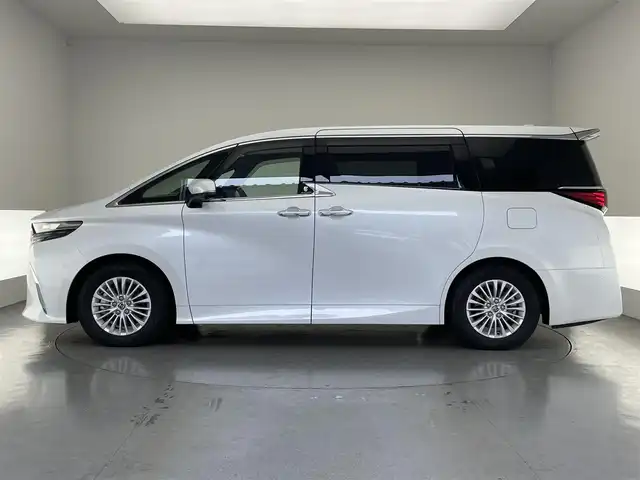 トヨタ アルファードハイブリット Z 愛知県 2024(令6)年 0.6万km プラチナホワイトパールマイカ 純正１４型DA　ムーンルーフ　HDMI　黒革　BSM　全方位カメラ　パーキングアシスト　追従クルコン　フルセグ　ETC２.0 ドラレコ　セーフティセンス　メモリーシート　パドルシフト　エアシート　禁煙　ステアリングヒーター　１５００W１００V充電　ワイヤレス充電　nanoe-X LEDオートライト　フォグランプ　純正フロアマット　USB　Bluetooth　コーナーセンサー　プッシュスタート　スマートキー　スペアタイヤ アドバンスドパーク