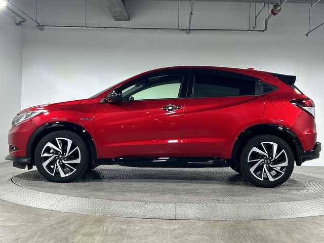 ホンダ ヴェゼル ハイブリッド RS ホンダセンシング 神奈川県 2016(平28)年 5.1万km プレミアムクリスタルレッドM ホンダセンシング/社外8型フローティングナビ【MDV-S810F】/・BT/フルセグTV/CD/DVD/USB/HDMI/SD/バックカメラ/ハーフレザーシート/シートヒーター(D/N)/電動サイドブレーキ/ブレーキホールド/スポーツモード/ビルトインETC/前後ドライブレコーダー/革巻きステアリング/ステアリングスイッチ/パドルシフト/Autoライト/ECON/フロントデアイサー/自動防眩ミラー/スマートキー/プッシュスタートボタン/LEDヘッドライト/フォグランプ/シートリフター/電動格納ミラー/ウィンカーミラー/純正フロアマット/純正18インチアルミホイール/純正ドアバイザー