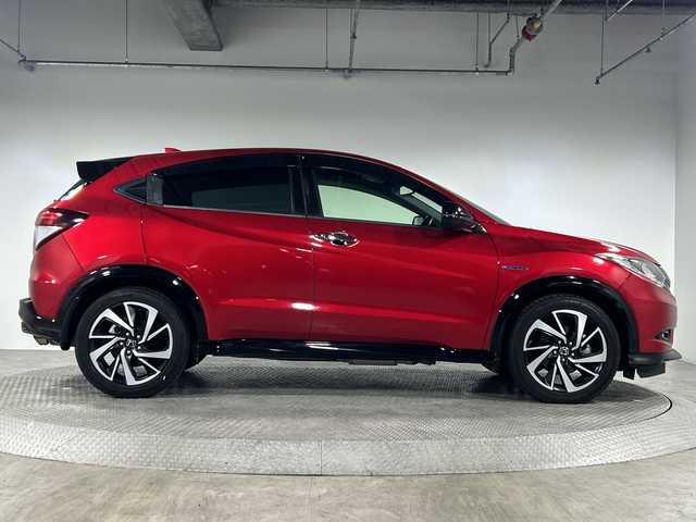 ホンダ ヴェゼル ハイブリッド RS ホンダセンシング 神奈川県 2016(平28)年 5.1万km プレミアムクリスタルレッドM ホンダセンシング/社外8型フローティングナビ【MDV-S810F】/・BT/フルセグTV/CD/DVD/USB/HDMI/SD/バックカメラ/ハーフレザーシート/シートヒーター(D/N)/電動サイドブレーキ/ブレーキホールド/スポーツモード/ビルトインETC/前後ドライブレコーダー/革巻きステアリング/ステアリングスイッチ/パドルシフト/Autoライト/ECON/フロントデアイサー/自動防眩ミラー/スマートキー/プッシュスタートボタン/LEDヘッドライト/フォグランプ/シートリフター/電動格納ミラー/ウィンカーミラー/純正フロアマット/純正18インチアルミホイール/純正ドアバイザー