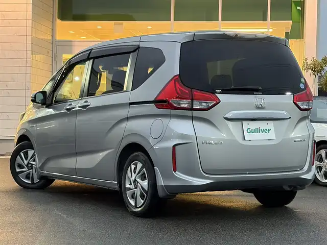 ホンダ フリード ハイブリット G ホンダセンシング 兵庫県 2016(平28)年 7.8万km ルナシルバーM hosi純正メモリナビ/両側パワースライドドア/バックカメラ/追従有クルーズコントロール/オートライト/フルセグTV/Bluetooth接続/ETC/LEDヘッドライト/純正ドアバイザー/純正フロアマット/CD/DVD/純正ミュージックサーバー/スイッチスタート