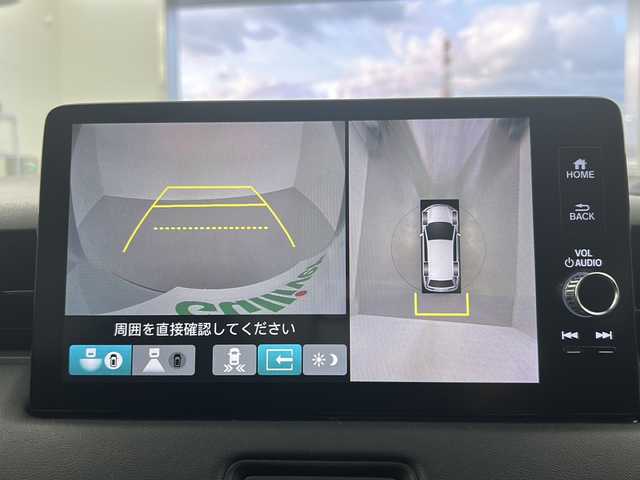 ホンダ ヴェゼル ハイブリッド e:HEV Z 岐阜県 2021(令3)年 2.4万km プレミアムサンライトホワイトパール ホンダコネクトディスプレイオーディオ/　(ナビ/フルセグTV/AM/FM/Bluetooth)/ホンダセンシング/・シティブレーキサポート/・ブラインドスポットモニター/・レーンキープアシスト/・前後踏み間違い衝突軽減システム/マルチビューカメラ/コーナーセンサー/パワーバックドア/LEDヘッドライト/シーケンシャルウィンカー/ETC2.0/ドライブレコーダー前後/置くだけ充電/純正フロアマット/ハーフレザーシート/シートヒーター/ハンドルヒーター/純正アルミホイール/ドアバイザー