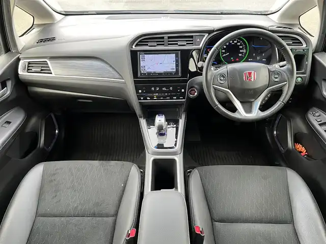ホンダ シャトル ハイブリッド Z 栃木県 2015(平27)年 3.8万km ミッドナイトブルービームM ワンオーナー /無限フロントエアロ/無限16インチAW/無限スポーツサスペンション（ダンパー・スプリング）/純正ナビ（Gathers）/・Bluetooth/USB/フルセグTV/DVD/CD/バックカメラ/シティブレーキサポートブレーキ/シートヒーター（前席）/ハーフレザーシート/クルーズコントロール/LEDヘッドランプ/オートライト機能付/革巻きステアリングホイール/前後ドライブレコーダー/ルーフレール /ETC/横滑り防止装置/スマートキー/スペアキー1本/保証書/取扱説明書
