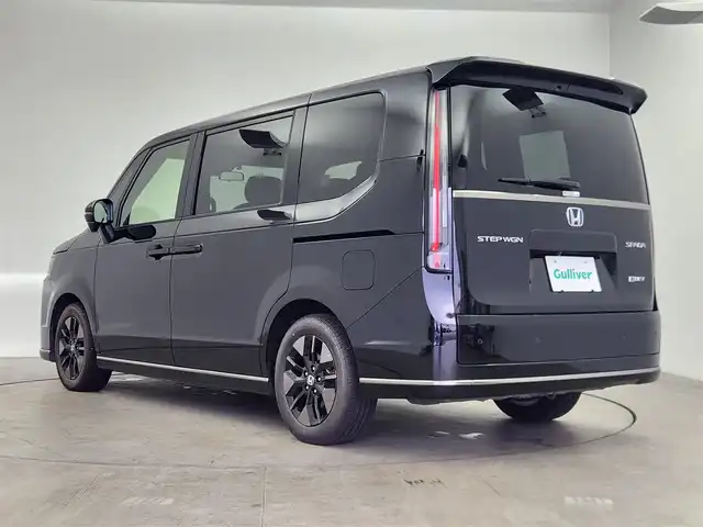 ホンダ ステップワゴン スパーダ eHEV 愛知県 2024(令6)年 2.6万km クリスタルブラックパール 純正11.4インチナビ/・フルセグTV/CD/DVD/Bluetooth/CarPlay/マルチビューカメラ/ビルドインETC/フリップダウンモニター/ドライブレコーダー/ホンダセンシング/・衝突軽減ブレーキ/・アダプティブクルーズコントロール/・車線逸脱支援システム/・アダプティブハイビームアシスト/・ブラインドスポットモニター/両側パワースライドドア/パワーバックドア/前席シートヒーター/パドルシフト/純正LEDヘッドライト/フォグランプ/ステアリングスイッチ/純正16インチアルミホイール