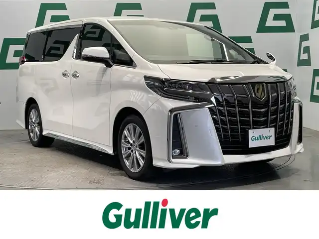 トヨタ アルファード S タイプゴールド 鹿児島県 2020(令2)年 6.1万km ホワイトパールクリスタルシャイン 禁煙車/トヨタセーフティセンス/・プリクラッシュセーフティ/・歩行者検知機能付衝突回避支援タイプ/・レーントレーシングアシスト/・レーダークルーズコントロール（全車速追従機能付）/・ロードサインアシスト/純正ナビ機能付きディスプレイオーディオ/バックカメラ/両側パワースライドドア/ETC/横滑り防止機能/3眼LEDヘッドライト/オートライト/オートマチックハイビーム/純正フロアマット/100V充電