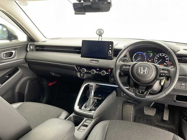 ホンダ ヴェゼル ハイブリッド e:HEV Z 長野県 2021(令3)年 2.1万km メテオロイドグレーメタリック 4WD/純正メモリナビ&フルセグTV&USB&BT/ホンダセンシング/アダプティブクルーズコントロール/レーンキープアシスト/車線逸脱警報/衝突軽減ブレーキ/ブラインドスポットインフォメーション/先行車発進告知/社外前後ドライブレコーダー/パワーバックドア/ハーフレザーシート/前席シートヒーター/ステアリングスイッチ/ステアリングヒーター/パドルシフト/全方位カメラ/ビルトインETC2.0/LEDヘッドライト/オートライト/フロントフォグランプ/電動格納ミラー/ウィンカーミラー/ドアミラーヒーター/電動ホールド/ブレーキホールド/純正18インチAW装着/純正フロアマット/社外ドアバイザー/置くだけ充電/プッシュスタート/スマートキー