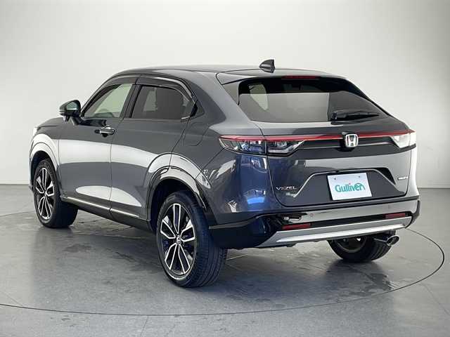 ホンダ ヴェゼル ハイブリッド e:HEV Z 長野県 2021(令3)年 2.1万km メテオロイドグレーメタリック 4WD/純正メモリナビ&フルセグTV&USB&BT/ホンダセンシング/アダプティブクルーズコントロール/レーンキープアシスト/車線逸脱警報/衝突軽減ブレーキ/ブラインドスポットインフォメーション/先行車発進告知/社外前後ドライブレコーダー/パワーバックドア/ハーフレザーシート/前席シートヒーター/ステアリングスイッチ/ステアリングヒーター/パドルシフト/全方位カメラ/ビルトインETC2.0/LEDヘッドライト/オートライト/フロントフォグランプ/電動格納ミラー/ウィンカーミラー/ドアミラーヒーター/電動ホールド/ブレーキホールド/純正18インチAW装着/純正フロアマット/社外ドアバイザー/置くだけ充電/プッシュスタート/スマートキー