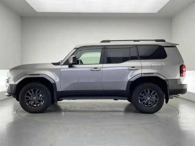 トヨタ ランドクルーザー ２５０ VX 愛知県 2024(令6)年 2.9万km アバンギャルドブロンズメタリック 純正１２．３インチディスプレイオーディオ/トヨタチームメイト　/丸目ヘッドライト　/モデリスタＰＫＧ　/シグネチャーイルミブレード　/モデリスタオーバーフェンダー　/リアバンパーステップガード/トヨタセーフティセンス/デジタルインナーミラー/アラウンドビューモニター/ムーンルーフ/ブラインドスポットモニター/HDMI/ステアリングヒーター/レーダークルーズコントロール/黒革シート/パワーシート/パワーバックドア/シートヒーター/エアシート/フルセグTV/前後ドライブレコーダー/ETC2.0/純正アルミホイール/純正フロアマット/LEDオートライト/フォグランプ/Miracast/衝突被害軽減ブレーキ