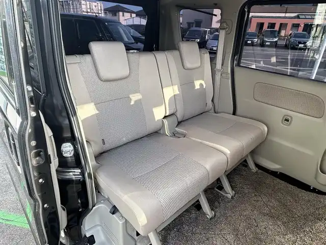 日産 ＮＶ１００クリッパー リオ G 長崎県 2015(平27)年 2.4万km ブルーイッシュブラック ワンオーナー/純正ナビ/　(Bluetooth/CD/DVD)/フルセグTV/パワースライドドア(両側)/電動オートステップ(助手席側)/ドライブレコーダー/ETC/インテリジェントエマージェンシーブレーキ/踏み間違い衝突防止アシスト/エマージェンシーストップシグナル/ビークルダイナミクスコントロール/IC付ターボ/HIDヘッドランプ/フロントフォグランプ/オートライト/オートエアコン/ステアリングスイッチ/純正14インチアルミホイール/インテリジェントキー/プッシュスタートボタン/保証書