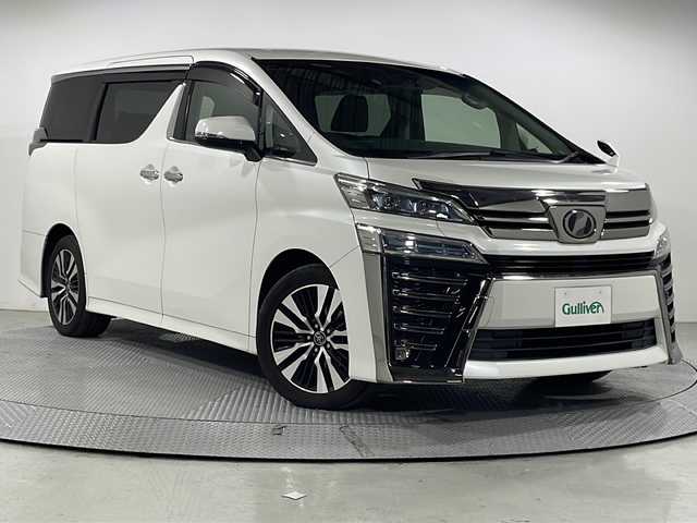トヨタ ヴェルファイア Z Gエディション 広島県 2018(平30)年 5.9万km ホワイトパールクリスタルシャイン 純正10型ナビ/純正フリップダウンモニター/両側パワースライドドア/ブラック合皮シート/パワーシート/シートヒーター/ベンチレーション/ステアリングヒーター/パワーオットマン/パワーバックドア/バックカメラ/クリアランスソナー/セーフティセンス/・プリクラッシュセーフティ/・レーンディパーチャーアラート/・オートマチックハイビーム/・レーダークルーズコントロール/LEDヘッドランプ/純正18インチAW/ETC2.0/ドライブレコーダー