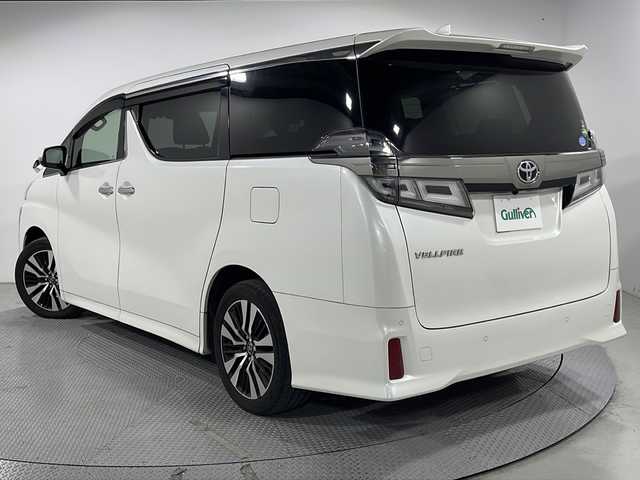 トヨタ ヴェルファイア Z Gエディション 広島県 2018(平30)年 5.9万km ホワイトパールクリスタルシャイン 純正10型ナビ/純正フリップダウンモニター/両側パワースライドドア/ブラック合皮シート/パワーシート/シートヒーター/ベンチレーション/ステアリングヒーター/パワーオットマン/パワーバックドア/バックカメラ/クリアランスソナー/セーフティセンス/・プリクラッシュセーフティ/・レーンディパーチャーアラート/・オートマチックハイビーム/・レーダークルーズコントロール/LEDヘッドランプ/純正18インチAW/ETC2.0/ドライブレコーダー