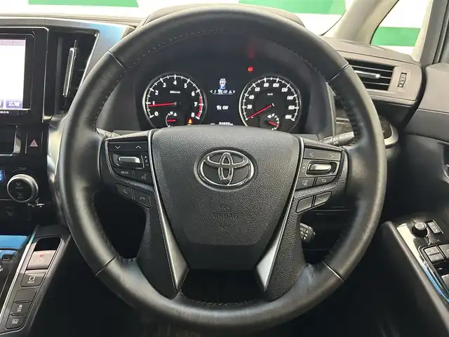 トヨタ ヴェルファイア Z Aエディション 鹿児島県 2015(平27)年 5.2万km ブラック 禁煙車　/純正ナビ　/・フルセグＴＶ　/・CD/・FM/AM/・BT/バックカメラ　/前後ドラレコ　/ビルドインＥＴＣ　/ＬＥＤヘッドライト　/オートライト　/フロントソナー　/バックソナー　/純正アルミ　/オットマン　/ハーフレザーシート　/スマートキー/両側パワスラ