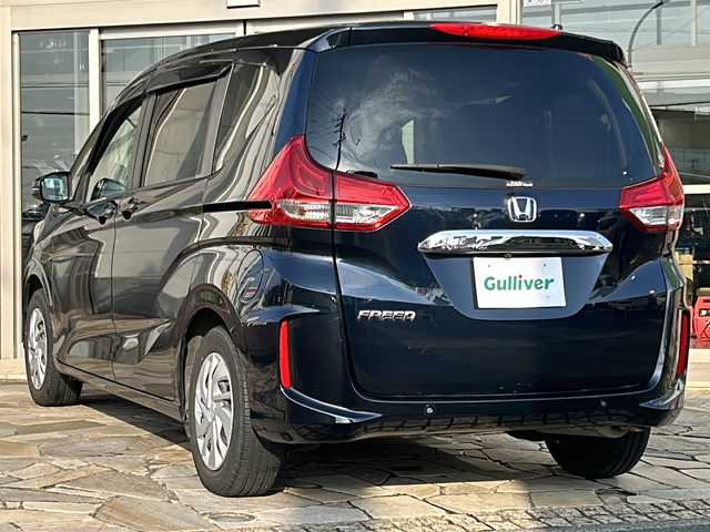 ホンダ フリード G ホンダセンシング 静岡県 2021(令3)年 1.8万km ミッドナイトブルービームM 純正ナビ/・CD/・FM/AM/・iPod/・SD/・USB/・Bluetooth/ホンダセンシング/アダプティブ・クルーズ・コントロール（ACC）/・作動車速域：約30km/hから100km/h間/車線維持支援システム（LKAS）/・作動車速：約65km/hから100km/h間/・ステアリング制御/衝突軽減ブレーキ（CMBS）/・歩行者検知機能/・作動車速：約80km/h未満時/・対向車車速：約30km/hから80km/h時/誤発進抑制機能（前進）/・ミリ波レーダー検知：作動車速10km/h未満/歩行者事故低減ステアリング/・作動車速10km/hから40km/h間/路外逸脱抑制機能/・作動車速：約60km/hから100km/h間/先行車発進お知らせ機能/標識認識機能/オートハイビーム/主要装備/・ＥＴＣ/・ドライブレコーダー/・レーダークルーズコントロール/・両側パワースライドドア/・バックカメラ/・運転席+助手席シートヒーター/・ＬＥＤヘッドライト/・アクティブコーナリングライト/・横滑り防止装置/・アイドリングストップ
