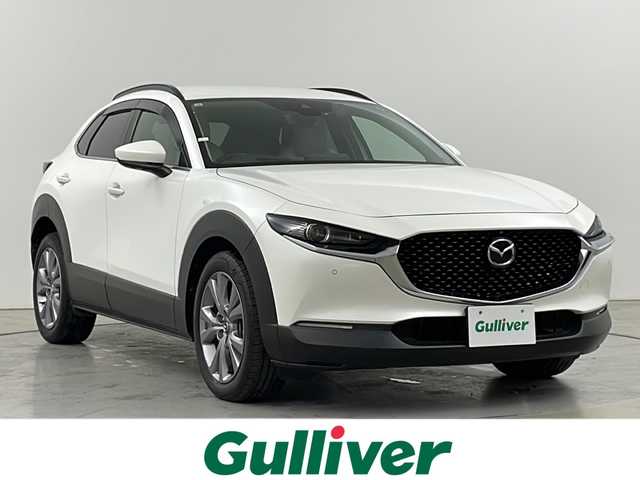 マツダ ＣＸ－３０ XD Lパッケージ 道央・札幌 2021(令3)年 1.4万km スノーフレイクホワイトパールマイカ ・4WD/ディーゼルターボ/・i-ACTIVSENSE/・衝突被害軽減ブレーキ/・レーダークルーズコントロール/・セーフティパッケージ/・純正ナビ　BOSEサウンド/・DVD.CD.SD.Bluetooth/・フルセグTV/全方位カメラ/・アクティブドライビングディスプレイ/・パワーバックドア /・LEDライト/オートハイビーム/・ホワイトレザーシート/・D.N席パワーシート/シートヒーター/・パドルシフト/・コーナーセンサー/・ETC