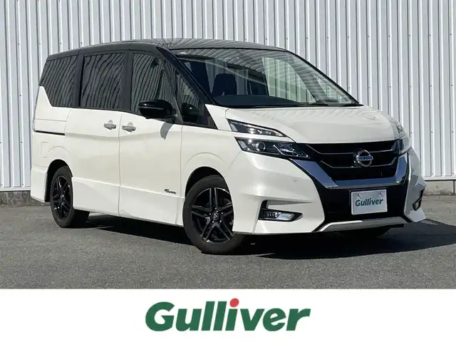 日産 セレナ ハイウェイスター Vセレクション 福岡県 2017(平29)年 3.5万km ブリリアントホワイトパール 2トーン プロパイロット/フリップダウンモニター/純正９インチナビ（ＭＭ５１７Ｄ－Ｌ）/フルセグTV/CD/DVD/BT/SD/AUX/全周囲カメラ/デジタルインナーミラー/エマージェンシーブレーキ/LDW/コーナーセンサー/レーダークルーズコントロール/ハーフレザー/両側パワースライドドア/パーキングアシスト/ＡＣ１００Ｖ/社外ＡＷ/LEDオートライト/ビルトインETC/電動パーキング/ブレーキホールド/ロールサンシェード/シートバックテーブル/電格ミラー