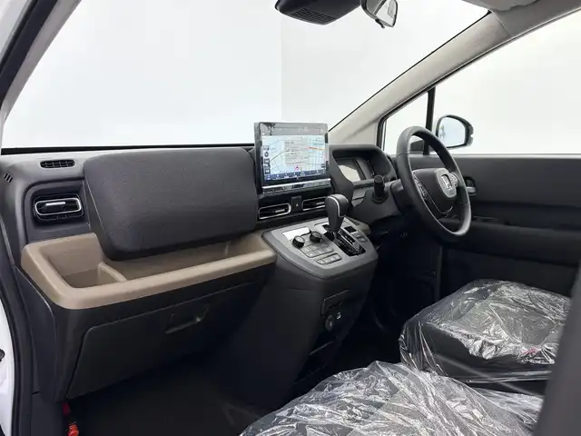 ホンダ フリード ハイブリット e:HEV AIR EX 愛知県 2025(令7)年 0.1千km プラチナホワイトパール 登録済未使用車/純正ナビ/バックカメラ/両側パワースライドドア/ブラインドスポットモニター/純正15インチアルミホイール/衝突軽減ブレーキ/アダプティブクルーズコントロール/路外逸脱抑制機能/パーキングセンサー/オートハイビーム/フルセグTV/LEDヘッドライト/シートヒーター/ハーフレザーシート/スマートキー/プッシュスタート/電動格納ミラー/Bluetooth