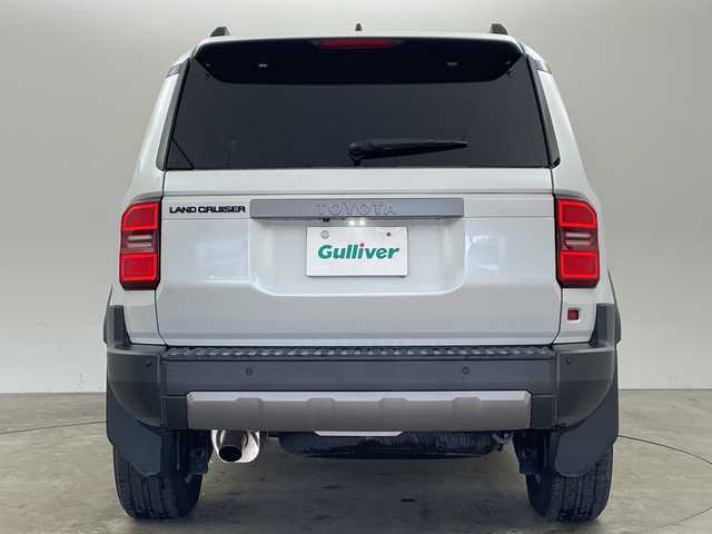 トヨタ ランドクルーザー ２５０ VX 兵庫県 2025(令7)年 1.1万km プラチナホワイトパールマイカ ・純正12.3インチディスプレイオーディオ/TV/Bluetooth/USB/HDMI/・パノラミックビューモニター/・ビルトインETC2.0/・サンルーフ/・デジタルインナーミラー/・Toyota　Safety　Sense/・プリクラッシュセーフティ/・緊急時操舵支援/・フロントクロストラフィックアラート/・レーンチェンジアシスト/・レーントレーシングアシスト/・レーンディパーチャーアラート/・レーダークルーズコントロール（全車速追従機能付）/・オートマチックハイビーム/・ロードサインアシスト/・ドライバー異常時対応システム/・プロアクティブドライビングアシスト/・発進遅れ告知機能/・丸目LEDヘッドライト/・アドバンスドドライブ/・本革シート/・運転席パワーシート/・前席シートヒーター/・前席ベンチレーション/・ステアリングヒーター/・パワーバックドア/・ルーフレール/・nanoeX/・スマートキー/・純正18インチアルミホイール