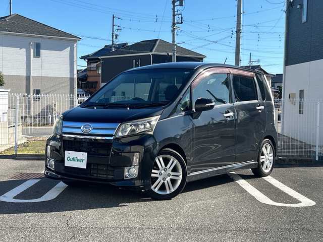 ダイハツ ムーヴ カスタム RS 三重県 2013(平25)年 10.6万km ブラックマイカメタリック 登録時106104km/社外ナビ/（AM/FM/TV/Bluetooth）/フルセグTV/バックカメラ/ETC/オートライト/MOMOステアリング/プッシュスタート/純正アルミ/純正フロアマット