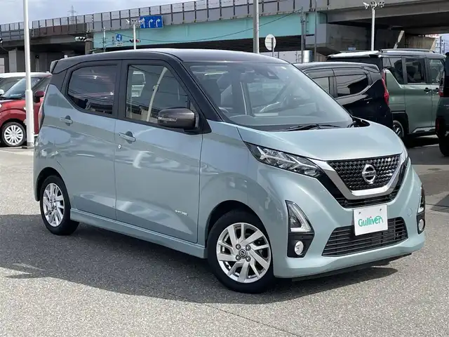 日産 デイズ ハイウェイスターX 石川県 2020(令2)年 1.4万km アッシュブラウン/ソーダブルー ワンオーナー/社外7型メモリーナビ/フルセグTV/アラウンドビューモニター/エマージェンシーブレーキ/アイドリングストップ/横滑り防止/オートエアコン/ETC/ドライブレコーダー/インテリキー/プッシュスタート/ベンチシート/純正アルミホイール/保証書