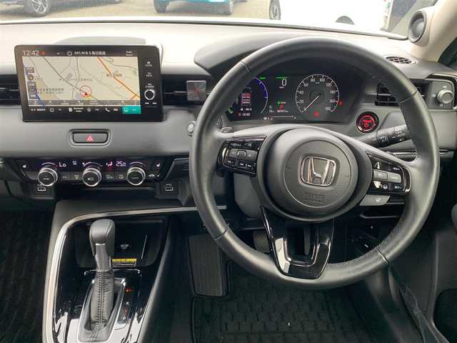 ホンダ ヴェゼル ハイブリッド e:HEV Z 大阪府 2021(令3)年 0.7万km プラチナホワイトパール 純正9インチナビ/   フルセグTV/Bluetooth/USB/衝突軽減/BSM/全方位モニター/シートヒーター/フルエアロ/レーダークルーズコントロール/電動リアゲート/前後ドライブレコーダー/純正フロアマット/ワイヤレス充電/ETC2.0/LEDヘッドライト