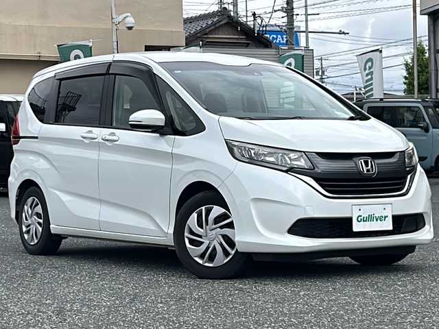 ホンダ フリード G ホンダセンシング 愛知県 2019(平31)年 4万km ホワイトオーキッドパール ディーラーSDナビ/(Bluetooth/フルセグTV/DVD)/バックカメラ/ホンダセンシング/(アダプティブクルーズコントロール/先行車発進告知/レーキーピングアシスト/歩行者事故低減ステアリング/標識認識機能/衝突軽減ブレーキ)/純正ビルトインETC/両側パワスラ/ステアリングスイッチ/スマートキー/(スペアキー×1)/取説/保証書