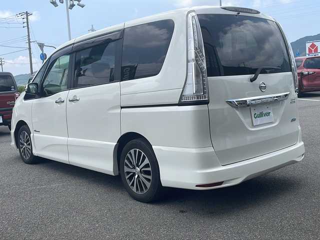日産 セレナ ハイウェイスター Sハイブリッド 兵庫県 2014(平26)年 6.5万km ブリリアントホワイトパール 純正SDナビ/・BT/・CD/DVD/・フルセグTV/純正フリップダウンモニター/オートクルーズコントロール/レーン逸脱警報/純正アルミホイール/純正フロアマット/両側パワースライドドア/Wエアバック/LEDライト