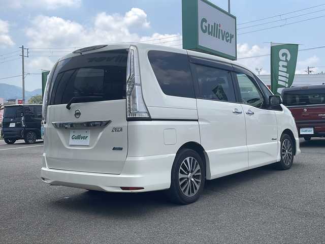 日産 セレナ ハイウェイスター Sハイブリッド 兵庫県 2014(平26)年 6.5万km ブリリアントホワイトパール 純正SDナビ/・BT/・CD/DVD/・フルセグTV/純正フリップダウンモニター/オートクルーズコントロール/レーン逸脱警報/純正アルミホイール/純正フロアマット/両側パワースライドドア/Wエアバック/LEDライト
