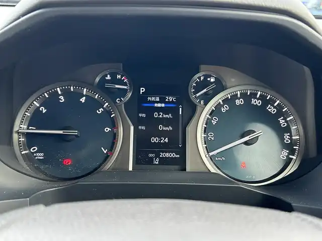 トヨタ ランドクルーザー プラド TX Lパッケージ 愛媛県 2023(令5)年 2.1万km ホワイトパールクリスタルシャイン 登録時走行距離：20800km/メーカーオプション純正メモリナビ/AM/FM/フルセグTV/Bluetooth/ETC/電動サードシート/パドルシフト/追従クルコン/レザーシート/シートヒーター/エアシート/衝突軽減システム/横滑り防止装置/盗難防止装置/レーンキープアシスト/LEDヘッドライト/オートライト/オートハイビーム/エンジンスタートボタン/スマートキー/スペアキー/純正アルミホイール/社外フロアマット