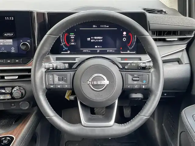日産 オーラ G 福岡県 2022(令4)年 3万km ピュアホワイトパール ワンオーナー/純正メーカーナビ/（フルセグTV/Bluetooth/ラジオ）/アラウンドビューモニター/プロパイロット機能/レーダークルーズコントロール/デジタルコックピット/BOSEプレミアムサウンド/(ヘッドレストスピーカー）/置くだけ充電/前席シートヒーター/ハーフレザーシート/電動パーキングブレーキ/オートブレーキホールド/ブラインドスポットモニター/ビルトインETC/ドライブレコーダー/ステアリングヒーター/純正フロアマット/スペアキー/取扱説明書/保証書