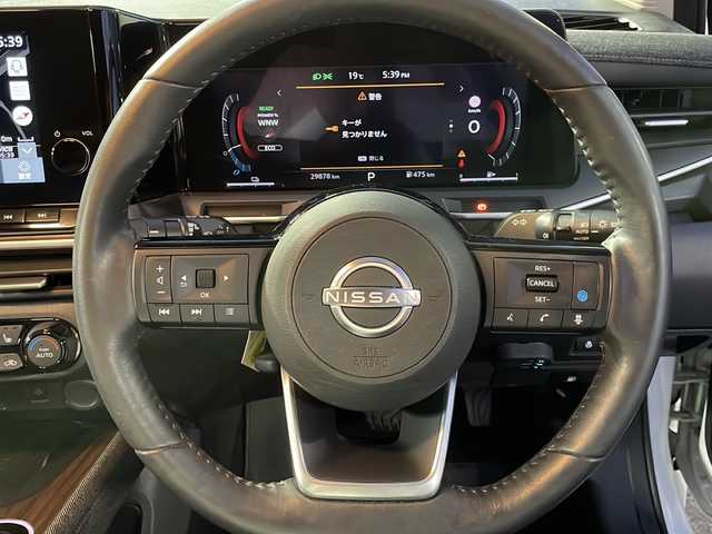 日産 オーラ G 山口県 2022(令4)年 3万km ピュアホワイトパール ワンオーナー/純正メーカーナビ/（フルセグTV/Bluetooth/ラジオ）/アラウンドビューモニター/プロパイロット機能/レーダークルーズコントロール/デジタルコックピット/BOSEプレミアムサウンド/(ヘッドレストスピーカー）/置くだけ充電/前席シートヒーター/ハーフレザーシート/電動パーキングブレーキ/オートブレーキホールド/ブラインドスポットモニター/ビルトインETC/ドライブレコーダー/ステアリングヒーター/純正フロアマット/スペアキー/取扱説明書/保証書