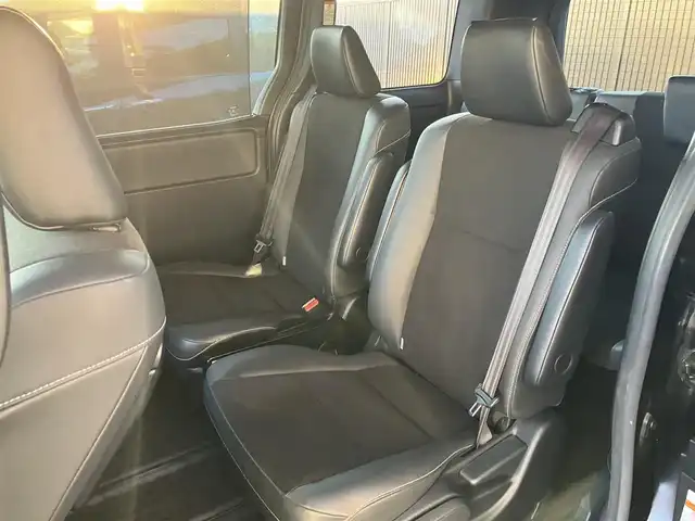 トヨタ ノア ハイブリッド Si ダブルバイビーⅡ 広島県 2019(平31)年 4.9万km ブラック ディーラーオプションナビ（NSZN-Z68T）/バックカメラ/フルセグTV/Bluetooth/純正フリップダウンモニター（V12T-R68C）/両側パワースライドドア/セーフティセンス/クルーズコントロール/LEDヘッドライト/LEDフォグライト/オートライト/シートヒーター（運転席・助手席）/新車保証書/取扱説明書/スペアキー