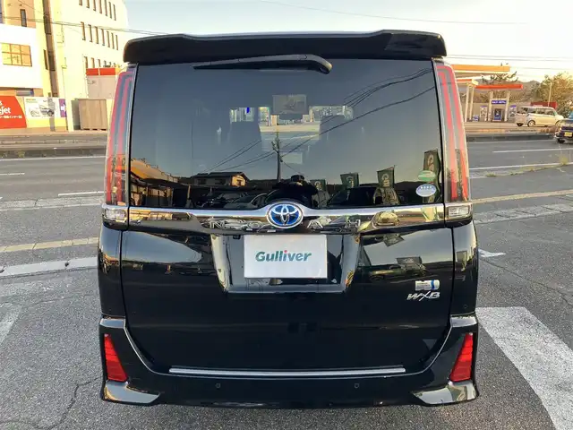 トヨタ ノア ハイブリッド Si ダブルバイビーⅡ 広島県 2019(平31)年 4.9万km ブラック ディーラーオプションナビ（NSZN-Z68T）/バックカメラ/フルセグTV/Bluetooth/純正フリップダウンモニター（V12T-R68C）/両側パワースライドドア/セーフティセンス/クルーズコントロール/LEDヘッドライト/LEDフォグライト/オートライト/シートヒーター（運転席・助手席）/新車保証書/取扱説明書/スペアキー