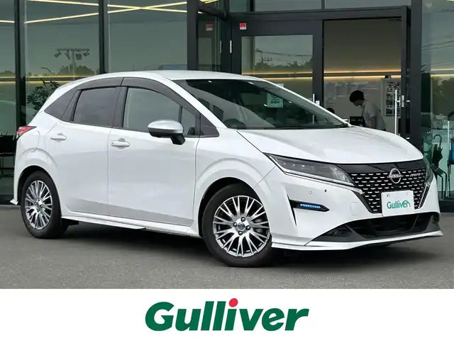 日産 ノート オーテック 東京都 2022(令4)年 1.4万km ピュアホワイトパール 純正ナビ/アラウンドビューモニター/ビルトインETC/インテリジェントルームミラー/LEDヘッドライト/スマートキー/レザーシート/エマージェンシーブレーキ/インテリジェント FCW/インテリジェント DA/インテリジェント LI/インテリジェント BSI/コーナーセンサー