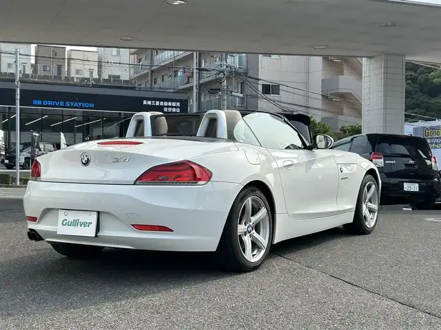 ＢＭＷ Ｚ４ sDrive20i 長崎県 2013(平25)年 8.2万km アルピンホワイトⅢ ・プッシュスタート/・純正ナビ（AM/FM/CD/DVD）/・シートヒーター（D/N）/・パドルシフト/・パーキングアシスト/・ETC/・オートライト/・ハンドルスイッチ