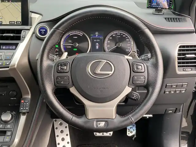 レクサス ＮＸ 300h Fスポーツ 香川県 2017(平29)年 3.2万km グラファイトブラックガラスフレーク 登録時走行距離：31294km/　CD DVD BT フルセグTV/バックカメラ/レザーシート/シートベンチレーション/パワーシート/シートメモリ/革巻きステアリング/ステアリングスイッチ/ステアリングヒーター/パワーバックドア/プリクラッシュセーフティシステム/レーダークルーズコントロール/クリアランスソナー/LEDヘッドライト/オートライト/フォグランプ/MTモード付AT/パドルシフト/アルミペダル/オートホールド機能付き電子パーキングブレーキ/ビルトインETC2.0/プッシュスタート/スマートキー