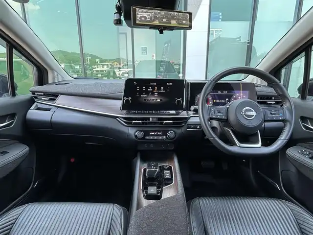 日産 オーラ G レザーエディション 香川県 2022(令4)年 4.8万km 黒 登録時走行距離：47487Kｍ/BOSEプレミアムサウンド/アラウンドビューモニター/プロパイロット/ブラインドスポッドモニター/クルーズコントロール/純正9インチナビ/インテリジェントルームミラー/フルセグテレビ/LEDヘッドライト/ETC/ドライブレコーダー/ワイヤレス充電/Bluetooth/革巻きステアリング/ステアリングリモコン/プッシュスタート/純正フロアマット/禁煙車/バイザー