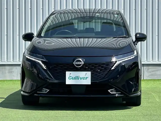 日産 オーラ G レザーエディション 香川県 2022(令4)年 4.8万km 黒 登録時走行距離：47487Kｍ/BOSEプレミアムサウンド/アラウンドビューモニター/プロパイロット/ブラインドスポッドモニター/クルーズコントロール/純正9インチナビ/インテリジェントルームミラー/フルセグテレビ/LEDヘッドライト/ETC/ドライブレコーダー/ワイヤレス充電/Bluetooth/革巻きステアリング/ステアリングリモコン/プッシュスタート/純正フロアマット/禁煙車/バイザー