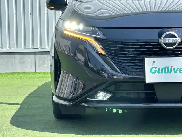 日産 オーラ G レザーエディション 香川県 2022(令4)年 4.8万km 黒 登録時走行距離：47487Kｍ/BOSEプレミアムサウンド/アラウンドビューモニター/プロパイロット/ブラインドスポッドモニター/クルーズコントロール/純正9インチナビ/インテリジェントルームミラー/フルセグテレビ/LEDヘッドライト/ETC/ドライブレコーダー/ワイヤレス充電/Bluetooth/革巻きステアリング/ステアリングリモコン/プッシュスタート/純正フロアマット/禁煙車/バイザー
