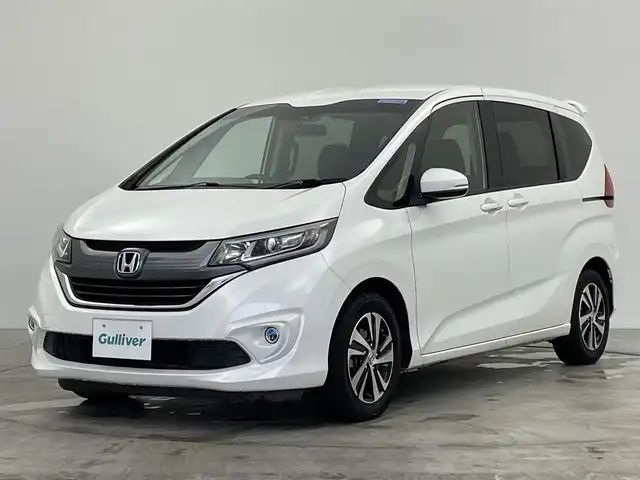 ホンダ フリード G ホンダセンシング 群馬県 2018(平30)年 9.9万km ホワイトオーキッドパール 禁煙車　純正ナビ　バックカメラ　フルセグ　Ｂｌｕｅｔｏｏｔｈ　両側パワースライドドア　クルーズコントロール　衝突軽減システム　車線逸脱警報　ビルトインＥＴＣ　フロントガラス熱線　アイドリングストップ