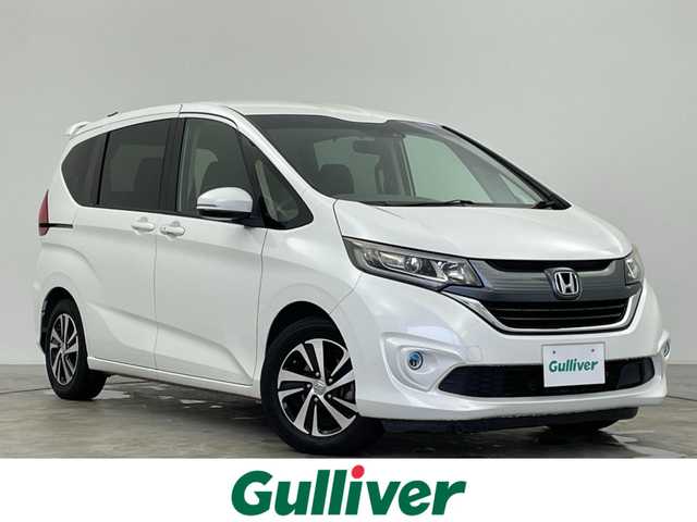 ホンダ フリード G ホンダセンシング 群馬県 2018(平30)年 9.9万km ホワイトオーキッドパール 禁煙車　純正ナビ　バックカメラ　フルセグ　Ｂｌｕｅｔｏｏｔｈ　両側パワースライドドア　クルーズコントロール　衝突軽減システム　車線逸脱警報　ビルトインＥＴＣ　フロントガラス熱線　アイドリングストップ