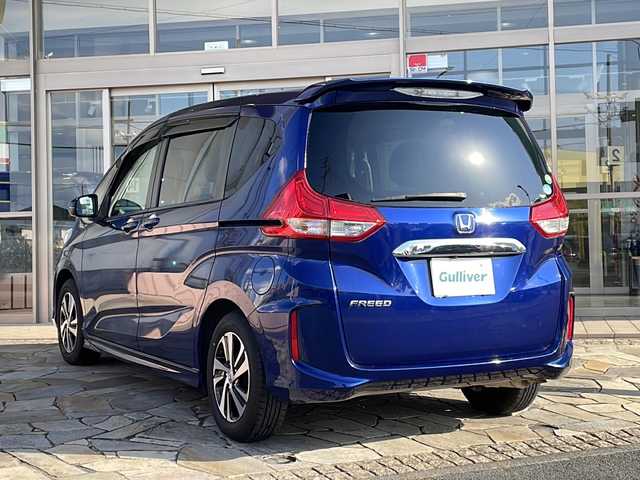 ホンダ フリード G ホンダセンシング 静岡県 2017(平29)年 4.1万km 青 ホンダセンシング/衝突軽減ブレーキ/レーダークルーズコントロール/レーンキープアシスト/ロードサインアシスト/純正ディーラーナビ/フルセグTV/CD/DVD/Bluetooth/ラジオ/主要装備/両側パワースライドドア/バックカメラ/ETC/ステアリングリモコン/ドライブレコーダー/ハーフレザーシート/オートライト/プッシュスタート/スマートキー