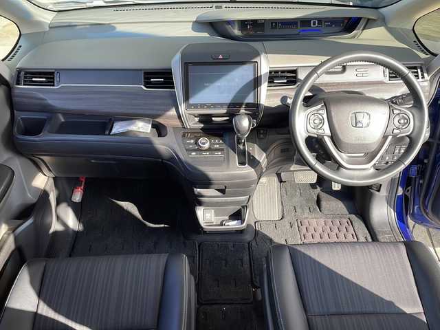 ホンダ フリード G ホンダセンシング 静岡県 2017(平29)年 4.1万km 青 ホンダセンシング/衝突軽減ブレーキ/レーダークルーズコントロール/レーンキープアシスト/ロードサインアシスト/純正ディーラーナビ/フルセグTV/CD/DVD/Bluetooth/ラジオ/主要装備/両側パワースライドドア/バックカメラ/ETC/ステアリングリモコン/ドライブレコーダー/ハーフレザーシート/オートライト/プッシュスタート/スマートキー