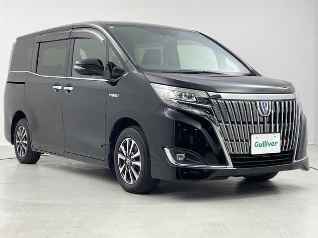 トヨタ エスクァイア ハイブリッド Gi 茨城県 2017(平29)年 5.7万km ブラック 純正９型ナビ　フルセグＴＶ　バックモニター　追従クルコン　衝突軽減ブレーキ　両側電動スライドドア　ＬＥＤライト　ビルトインＥＴＣ　シートヒーター　スマートキー　横滑り防止装置　アイドリングストップ