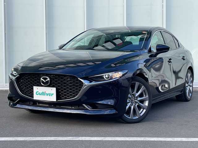 マツダ マツダ３セダン 15S ツーリング 神奈川県 2021(令3)年 1.7万km ディープクリスタルブルーマイカ ワンオーナー　/スペアキー1本/純正SDナビ　BT/CD/DVD/USB/ヘッドアップディスプレイ　/３６０°セーフティパッケージ　/ＭＴモード付ＡＴ　/レーダークルーズコントロール　/全方位カメラ　/ビルドインＥＴＣ　/前後ドラレコ　/純正フロアマット　/純製ＡＷ/ABS/横滑り防止装置/盗難防止装置/オートライト　/オートマチックハイビーム　/LEDヘッドライト