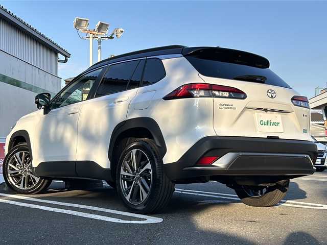トヨタ カローラ クロス ハイブリッド Z 東京都 2024(令6)年 0.4万km アティチュードブラックマイカ/プラチナホワイトパールマイカ ・ガラスルーフ/・純正ナビ/・ビルトインETC/・フルセグTV/・クルーズコントール（追従あり）/・レーンキープアシスト/・オートライト/・横滑り防止機能/・電動リアゲート/・Bluetooth接続/・パワーシート（運転席のみ）/・プッシュスタート/・全席エアバック/・シートヒーター（前席のみ）/・保証書/・取説書
