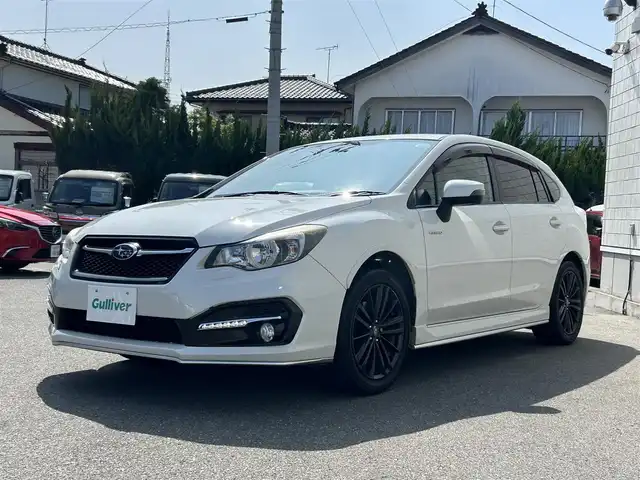 スバル インプレッサ スポーツ HV 2．0i-S アイサイト 山形県 2015(平27)年 11.1万km クリスタルホワイトP 禁煙車/４WD/社外ナビ/フルセグTV/FM/AM/DVD/SD/CD/Bluetooth/プリクラッシュブレーキ/レーンキープアシスト/全車速追従機能付クルーズコントロール/AT誤発進抑制制御/フルセグ/バックカメラ/ハーフレザーシート/パドルシフト/ETC/パワーシート/キセノンライト/AUTOライト/フォグランプ/プッシュスタート/スマートキー/USB端子/ダブルエアバック/純正マット/純正バイザー