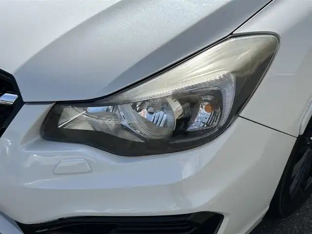 スバル インプレッサ スポーツ HV 2．0i-S アイサイト 山形県 2015(平27)年 11.1万km クリスタルホワイトP 禁煙車/４WD/社外ナビ/フルセグTV/FM/AM/DVD/SD/CD/Bluetooth/プリクラッシュブレーキ/レーンキープアシスト/全車速追従機能付クルーズコントロール/AT誤発進抑制制御/フルセグ/バックカメラ/ハーフレザーシート/パドルシフト/ETC/パワーシート/キセノンライト/AUTOライト/フォグランプ/プッシュスタート/スマートキー/USB端子/ダブルエアバック/純正マット/純正バイザー