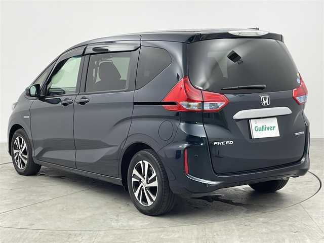 ホンダ フリード ハイブリット EX 愛知県 2018(平30)年 5.7万km フォレストグリーンパール 純正8インチメモリナビ/（フルセグTV/CD/DVD/BT）/バックカメラ/ハーフレザーシート/前席シートヒーター/ETC/ドラレコ/ワイパーデアイサー/衝突軽減システム/アダプティブクルーズコントロール/レーンキープアシスト/コーナーセンサー/両側パワスラ/純正LEDヘッドライト/純正フロアマット/純正15インチAW/ドアバイザー/エコノミーモード